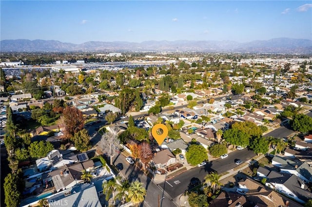 14027 Wyandotte St, Van Nuys, CA 91405 - aerial view of property and surrounding area with a mountain backdrop and nearby suburban area