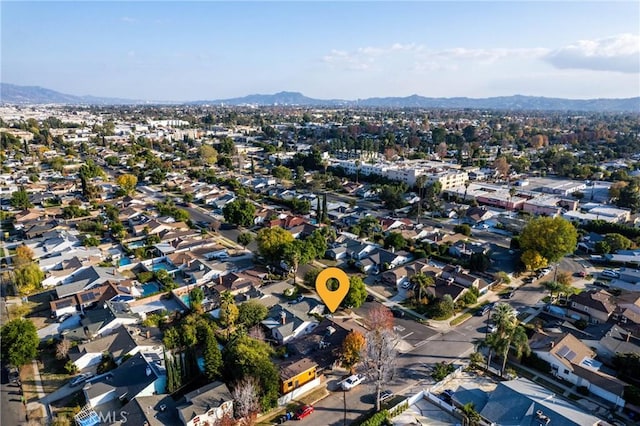 14027 Wyandotte St, Van Nuys, CA 91405 - aerial view of property's location featuring a mountainous background and nearby suburban area