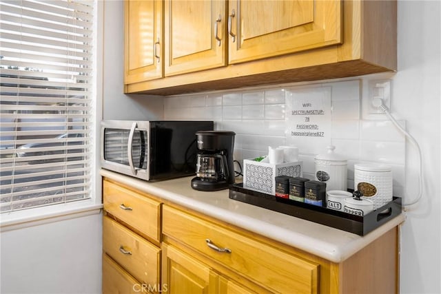 14027 Wyandotte St, Van Nuys, CA 91405 - bar with stainless steel microwave and decorative backsplash