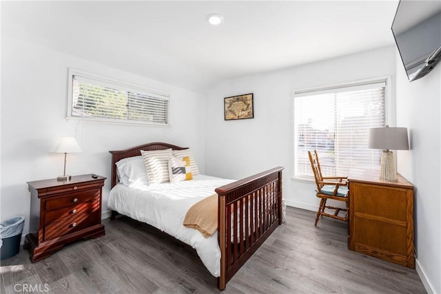 14027 Wyandotte St, Van Nuys, CA 91405 - bedroom featuring wood finished floors and baseboards