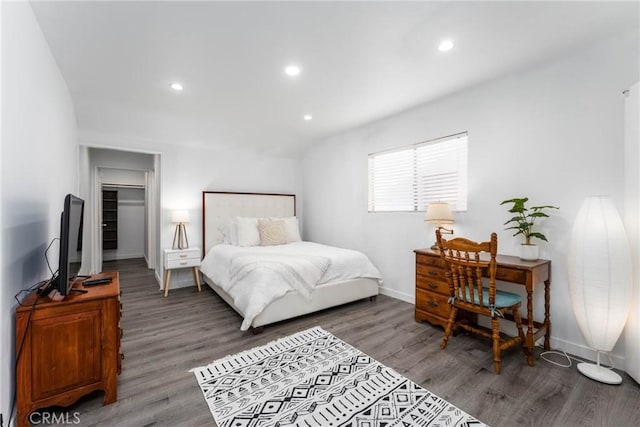 14027 Wyandotte St, Van Nuys, CA 91405 - bedroom with wood finished floors, recessed lighting, and baseboards