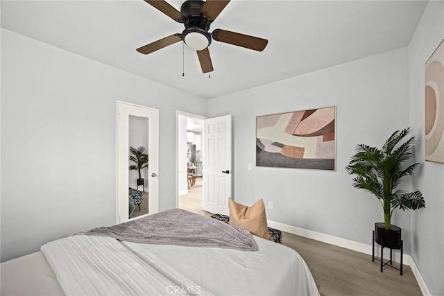 2461 Saint Pierre Ave, Altadena, CA 91001 - bedroom with baseboards, wood finished floors, and ceiling fan
