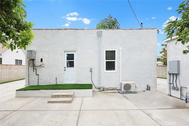 2461 Saint Pierre Ave, Altadena, CA 91001 - back of property with stucco siding, a patio area, and ac unit