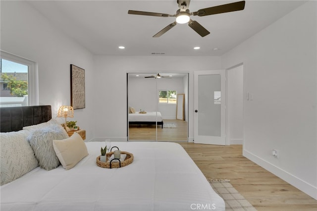 8332 Cherimoya Ave, Fontana, CA 92335 - bedroom with wood finished floors, baseboards, recessed lighting, and a ceiling fan
