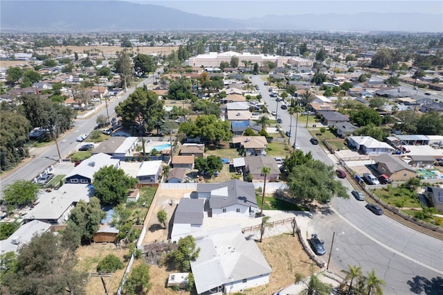 8332 Cherimoya Ave, Fontana, CA 92335 - aerial view of property and surrounding area featuring mountains and nearby suburban area
