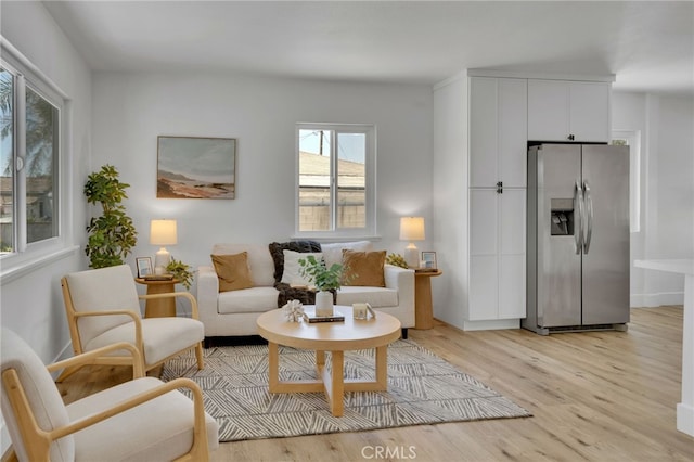 8332 Cherimoya Ave, Fontana, CA 92335 - living room featuring light wood-type flooring