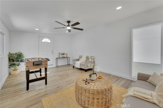 8332 Cherimoya Ave, Fontana, CA 92335 - living room featuring light wood-style flooring, a ceiling fan, recessed lighting, and baseboards