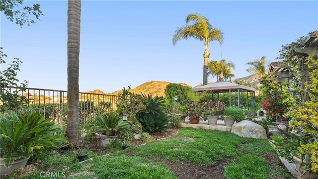 1551 Dominguez Ranch Rd, Corona, CA 92882 - view of yard with a gazebo and a mountain view