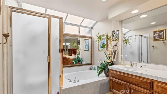 1551 Dominguez Ranch Rd, Corona, CA 92882 - bathroom featuring a stall shower, vanity, a garden tub, and recessed lighting