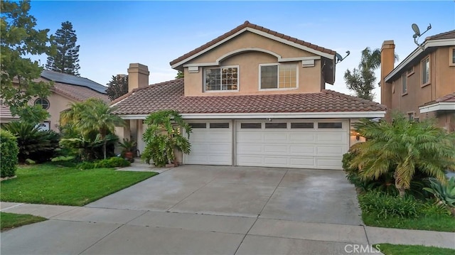 1551 Dominguez Ranch Rd, Corona, CA 92882 - mediterranean / spanish house featuring a tile roof, driveway, and stucco siding