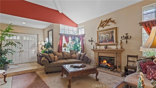 1551 Dominguez Ranch Rd, Corona, CA 92882 - tiled living area with plenty of natural light, a glass covered fireplace, and high vaulted ceiling