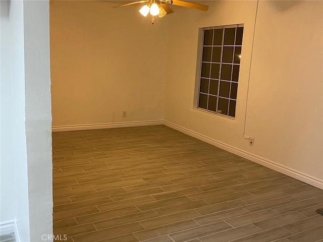 3352 Franklin Ave, Riverside, CA 92507 - empty room with dark wood finished floors, ceiling fan, and baseboards