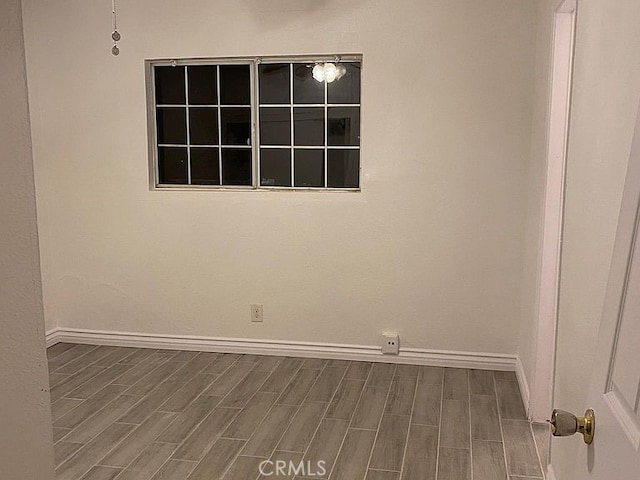 3352 Franklin Ave, Riverside, CA 92507 - empty room with wood finished floors and baseboards