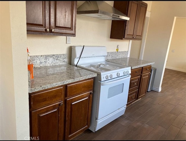 3352 Franklin Ave, Riverside, CA 92507 - kitchen featuring wall chimney range hood, white range oven, dark wood-style floors, baseboards, and dark brown cabinets
