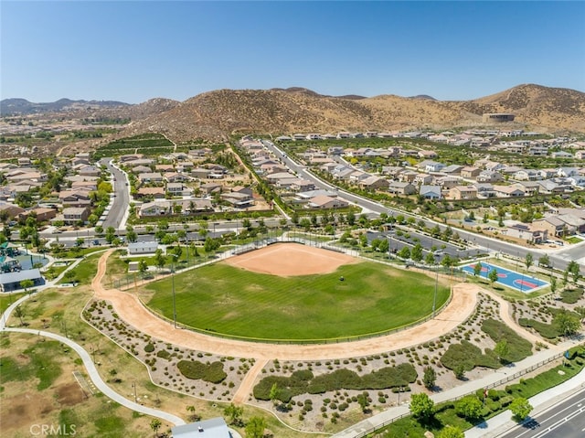 25303 Water Wheel Ct, Menifee, CA 92584 - aerial overview of property's location with nearby suburban area and a mountainous background