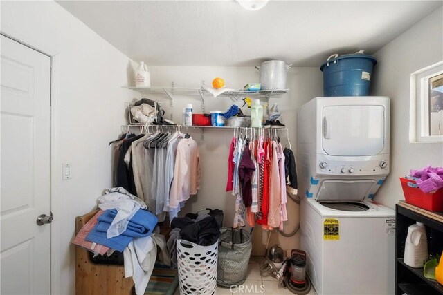 260 Pierce Ave, Barstow, CA 92311 - laundry area featuring estacked washer and dryer and tile patterned flooring