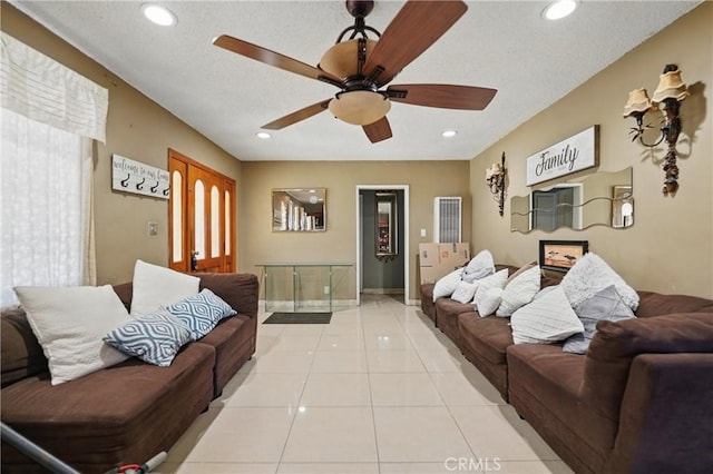 12737 Cometa Ave, San Fernando, CA 91340 - living room with ceiling fan, light tile patterned flooring, recessed lighting, and baseboards
