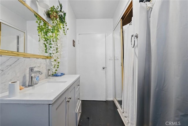 12737 Cometa Ave, San Fernando, CA 91340 - full bath with vanity, decorative backsplash, concrete floors, and curtained shower