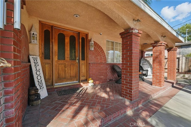 12737 Cometa Ave, San Fernando, CA 91340 - doorway to property with brick siding and a porch