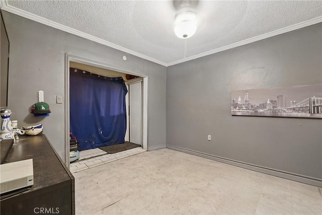12737 Cometa Ave, San Fernando, CA 91340 - spare room featuring crown molding and a textured ceiling