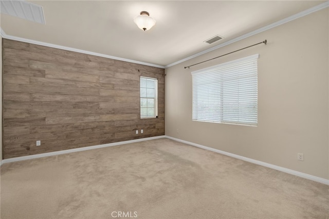3170 E Painted Crescent St, Ontario, CA 91762 - empty room featuring wood walls, crown molding, carpet flooring, and baseboards