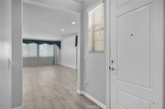 3170 E Painted Crescent St, Ontario, CA 91762 - hallway with baseboards, wood finished floors, and recessed lighting