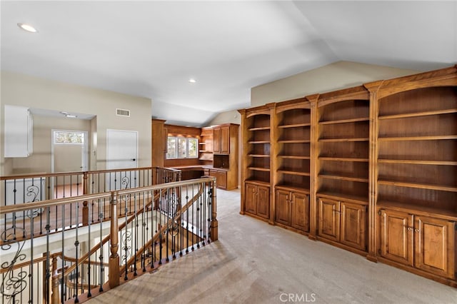 26021 Flintlock Ln, Laguna Hills, CA 92653 - hall with vaulted ceiling, an upstairs landing, light colored carpet, healthy amount of natural light, and recessed lighting
