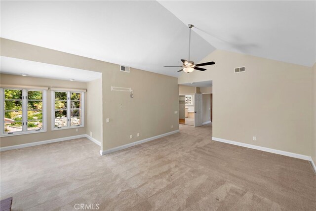 26021 Flintlock Ln, Laguna Hills, CA 92653 - empty room with light carpet, ceiling fan, vaulted ceiling, and baseboards