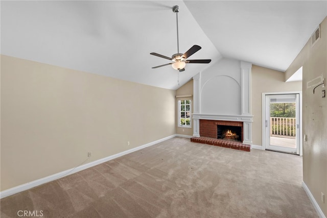 26021 Flintlock Ln, Laguna Hills, CA 92653 - unfurnished living room with ceiling fan, vaulted ceiling, carpet flooring, healthy amount of natural light, and a fireplace