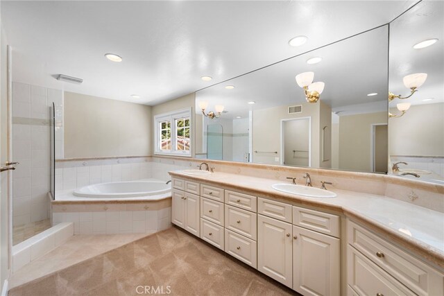26021 Flintlock Ln, Laguna Hills, CA 92653 - full bathroom featuring a bath, double vanity, recessed lighting, tile patterned flooring, and a tile shower