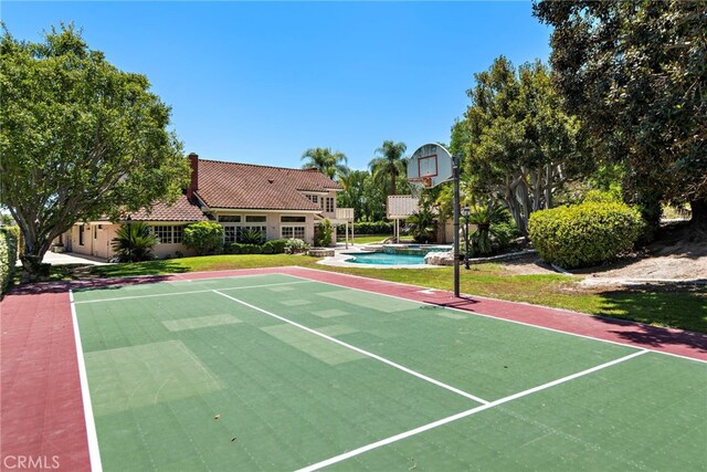 26021 Flintlock Ln, Laguna Hills, CA 92653 - view of sport court featuring community basketball court and a pool with connected hot tub