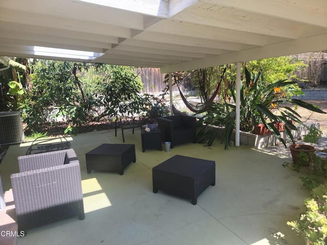 view of patio / terrace with an outdoor hangout area and central AC