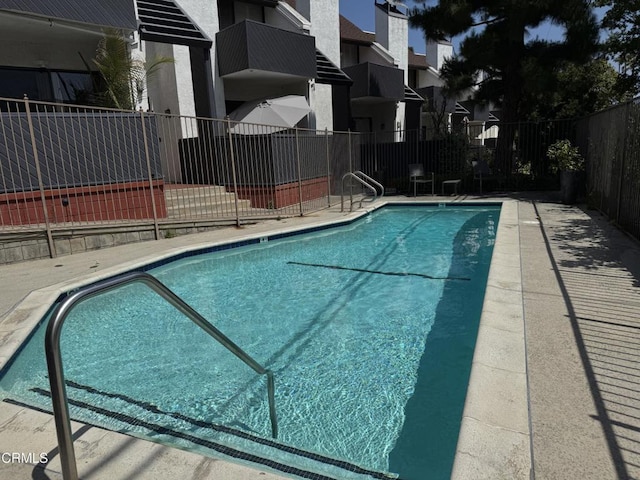 10720 Ohio Ave Unit 5, Los Angeles, CA 90024 - community pool featuring a residential view