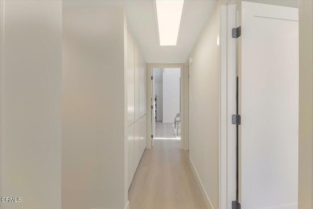 10720 Ohio Ave Unit 5, Los Angeles, CA 90024 - hallway with light wood-type flooring and baseboards