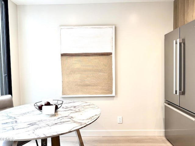 10720 Ohio Ave Unit 5, Los Angeles, CA 90024 - dining room featuring wood finished floors and baseboards