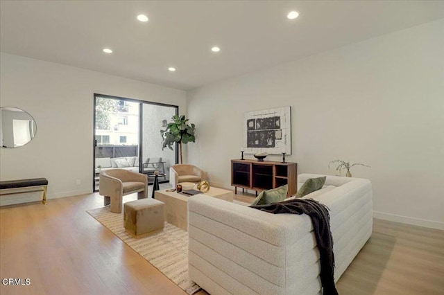 10720 Ohio Ave Unit 5, Los Angeles, CA 90024 - living area featuring light wood-type flooring, recessed lighting, and baseboards