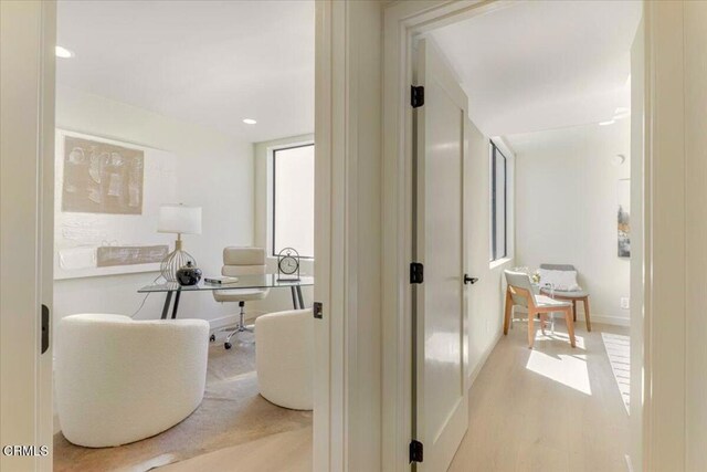 10720 Ohio Ave Unit 5, Los Angeles, CA 90024 - corridor featuring a desk, light wood-style flooring, recessed lighting, and baseboards