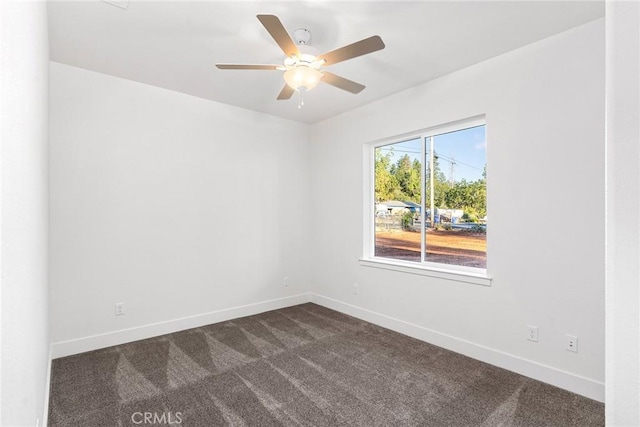 576 Roberts Rd, Paradise, CA 95969 - unfurnished room with dark colored carpet, baseboards, and a ceiling fan