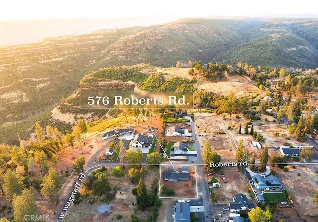 576 Roberts Rd, Paradise, CA 95969 - aerial view of property's location with property boundaries highlighted and mountains