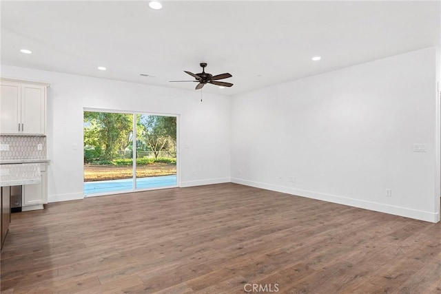576 Roberts Rd, Paradise, CA 95969 - unfurnished living room with ceiling fan, recessed lighting, wood finished floors, and baseboards