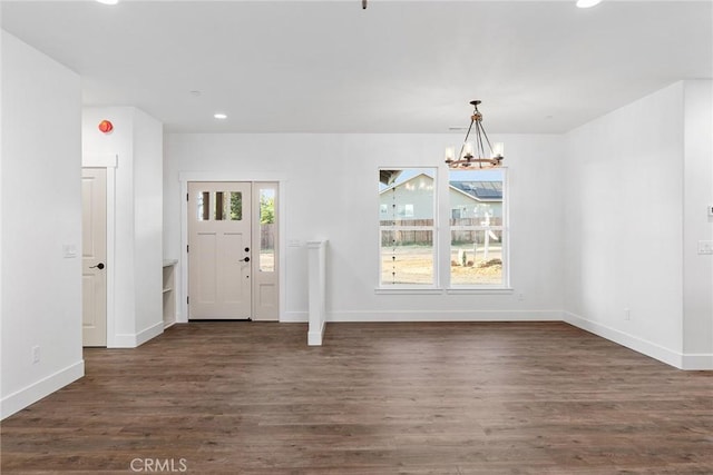 576 Roberts Rd, Paradise, CA 95969 - entrance foyer featuring dark wood-style flooring, baseboards, recessed lighting, and a chandelier