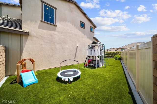 view of yard featuring a playground