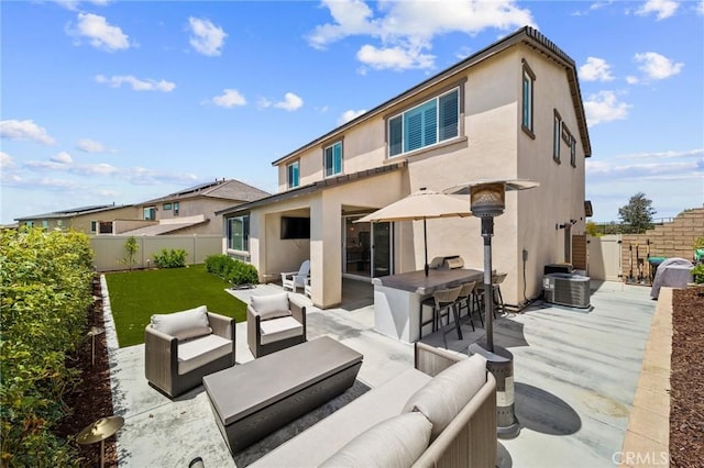 rear view of house featuring an outdoor living space, stucco siding, central air condition unit, a patio, and a fenced backyard