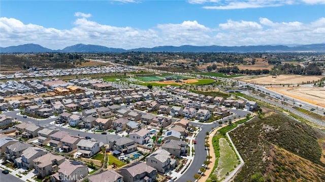 aerial perspective of suburban area with a mountain backdrop