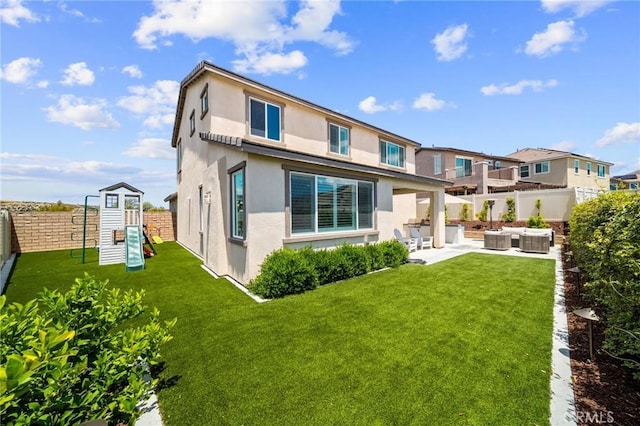 back of property with outdoor lounge area, stucco siding, a playground, a patio area, and cooling unit