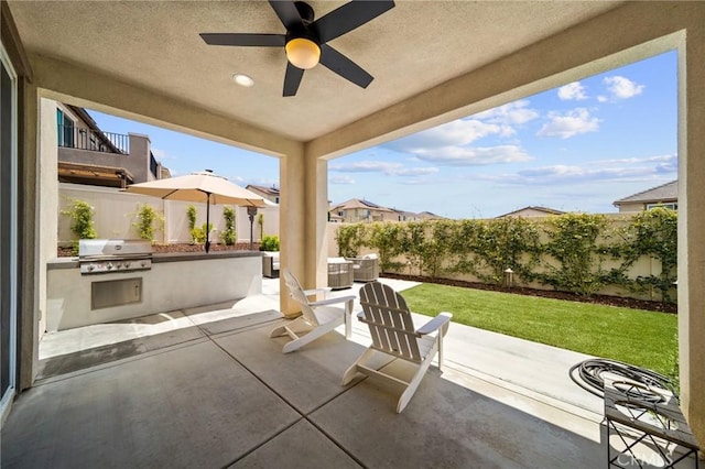view of patio / terrace with a ceiling fan