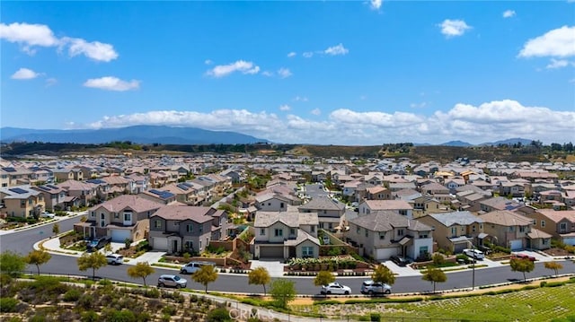 aerial perspective of suburban area featuring mountains