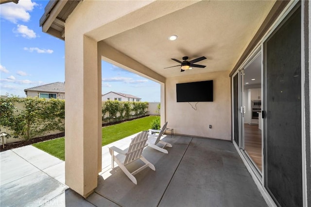view of patio with ceiling fan