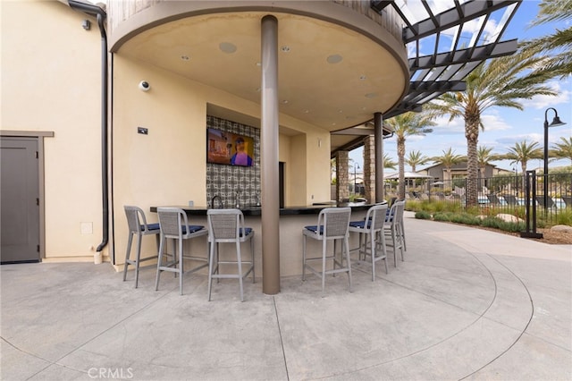 view of patio featuring a pergola