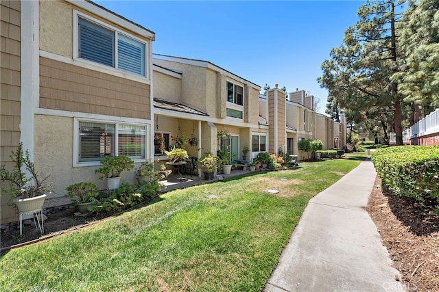 3340 E Collins Ave Unit 30, Orange, CA 92867 - surrounding community with a yard and a residential view